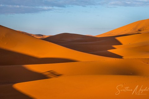 01.Moroc19_SM02240 
Africa, Morocco, April 2019
Sunrise in Sahara desert, Erg Chebbi dune, Arabic  camels, well, reflections