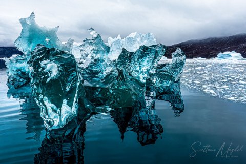 07.GRN_SM05616 
Greenland, September 2022
M/S Freya  Expedition 
East Greenland Scoresby Sound  fjord system 
Iceberg   city, Ice Sculptures (from Zodiac)